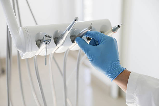 Professional Tooth Extraction technician working in Wilton Manors, FL